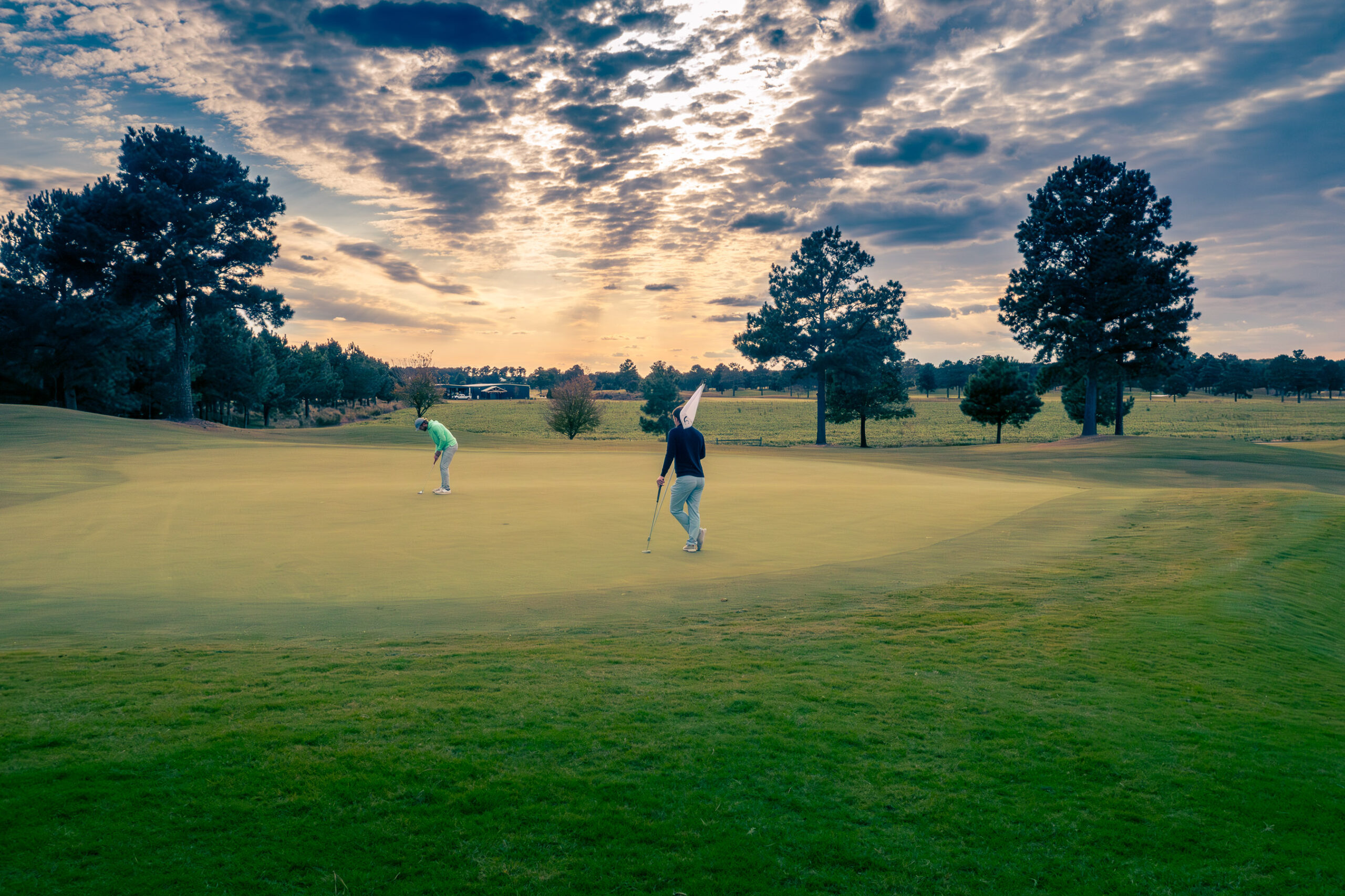 two men playing golf at cutter creek golf club